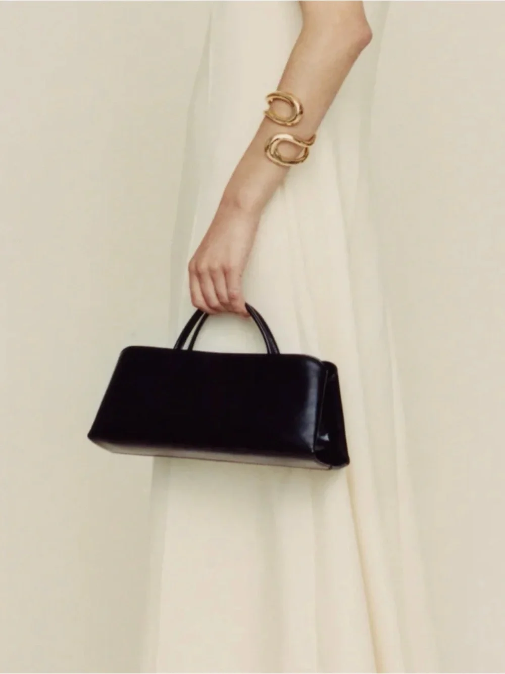 Black Eclair Top-Handle Clutch Bag